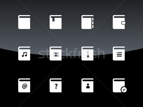 Book icons on black background. Stock photo © tkacchuk