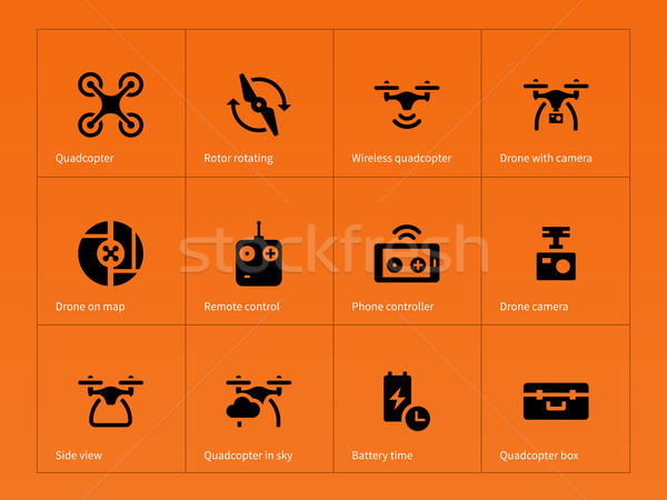 Wireless quadcopter and drone icons on orange background. Stock photo © tkacchuk