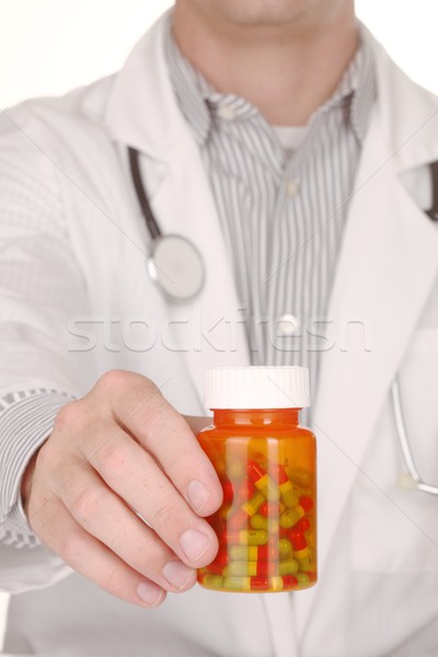 Lekarza lek recepta butelek przystojny medycznych Zdjęcia stock © tobkatrina