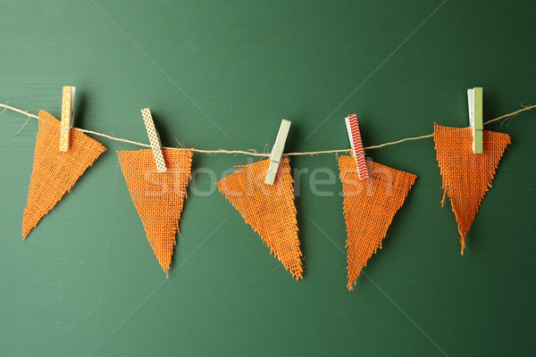 Burlap Pennants Hanging on a Green Chalkboard Stock photo © tobkatrina