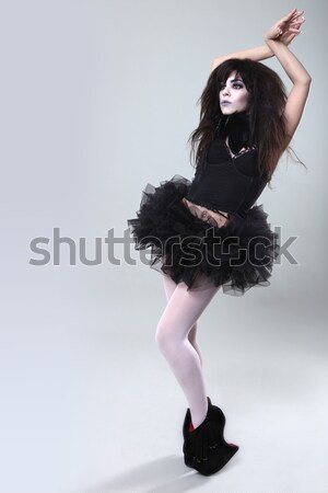 Gothic Expressive Girl on Plain Background Stock photo © tobkatrina