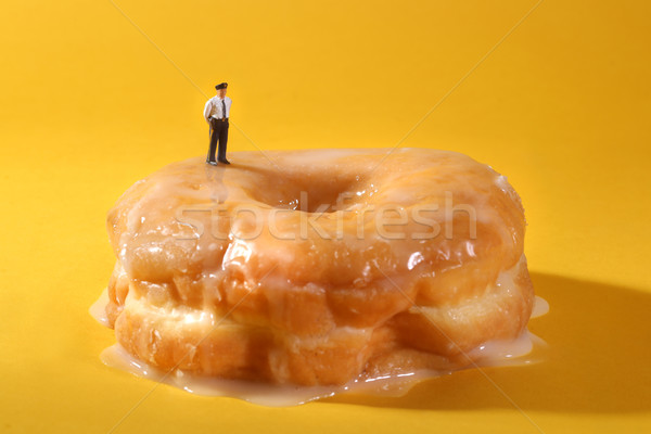 Police Officers in Conceptual Food Imagery With Doughnuts Stock photo © tobkatrina