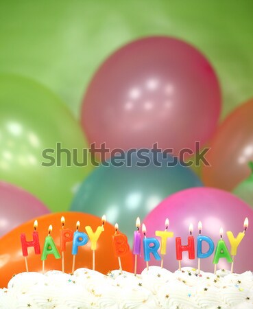 ünneplés léggömbök gyertyák torta boldog születésnapot kék Stock fotó © tobkatrina
