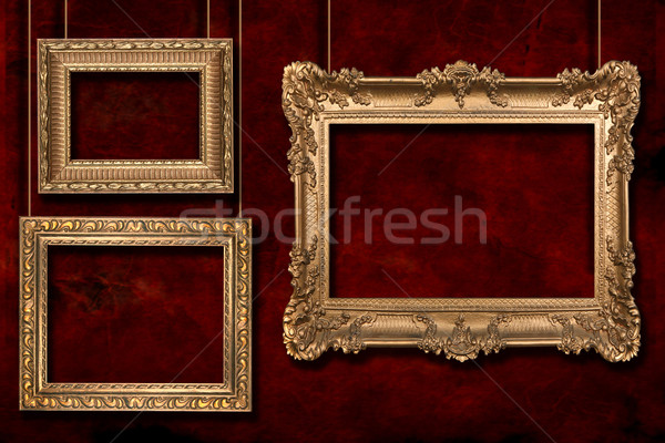 Gold Frames Hanging From Wire Poles Stock photo © tobkatrina