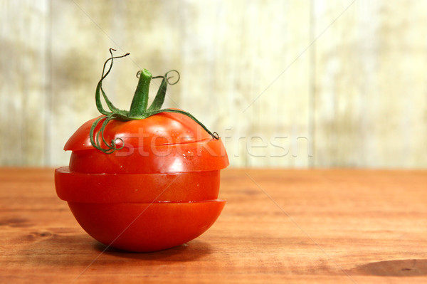 Tomatoes on a Rustic Wood Plank Stock photo © tobkatrina