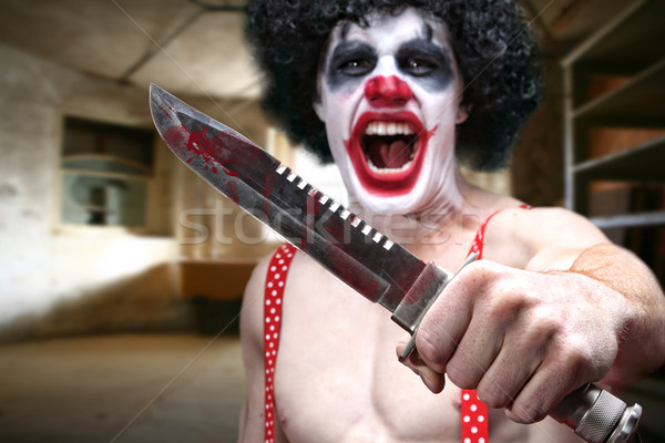 Angry Horror Clown in Condemned Building Stock photo © tobkatrina