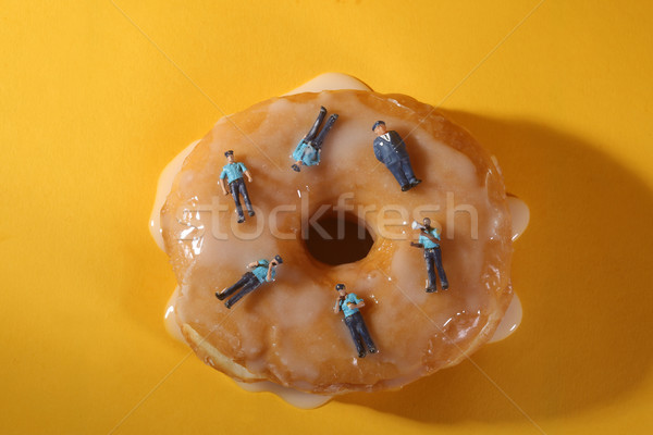 Police Officers in Conceptual Food Imagery With Donuts Stock photo © tobkatrina