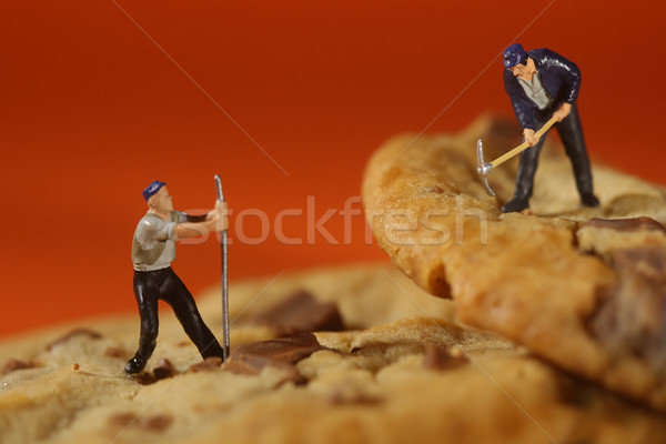  Plastic People Working on Chocolate Chip Cookies Stock photo © tobkatrina