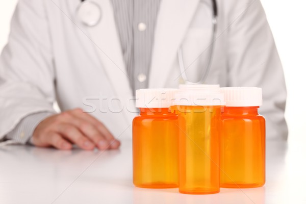 Doktor boş turuncu reçete şişeler erkek doktor Stok fotoğraf © tobkatrina