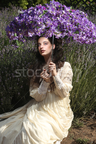 Pretty Young Girl Outdoors in a Lavender Flower Field Stock photo © tobkatrina