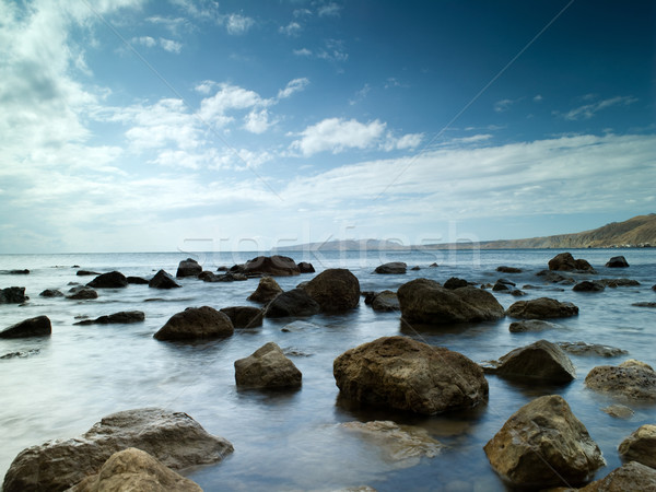 Sleeping sea under the blue sky Stock photo © tolokonov