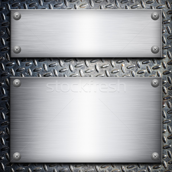 Brushed steel plate over black metall background for your design Stock photo © tolokonov