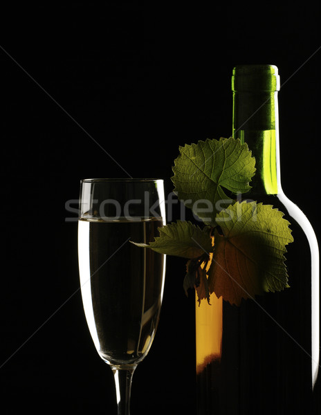 Stock photo: Old wine. Still life over black background