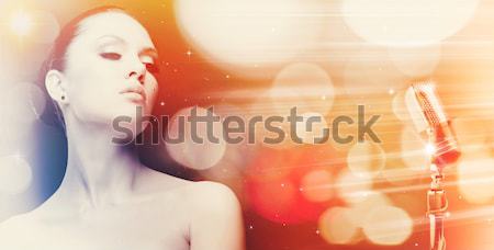 Beauty. Female outdoors portrait with floral backgrounds Stock photo © tolokonov