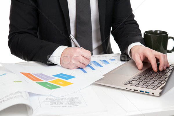 Businessman analysing data  Stock photo © tommyandone