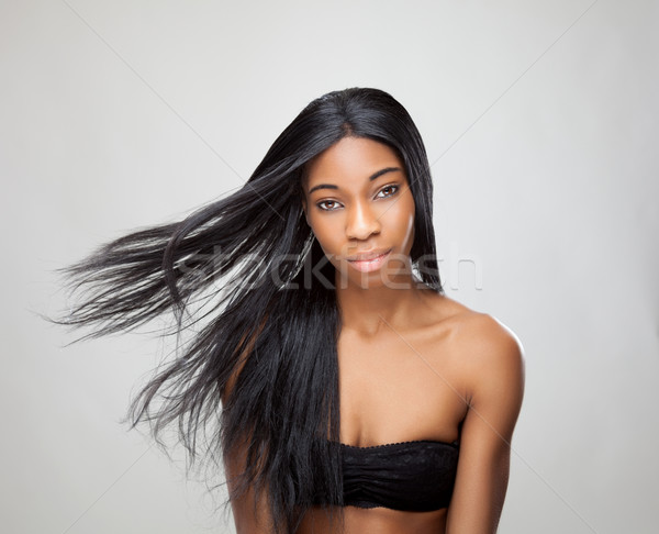 Beautiful black woman with long straight hair Stock photo © tommyandone