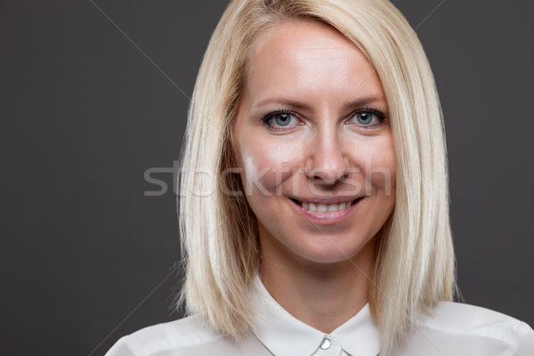 Headshot of young and happy business woman  Stock photo © tommyandone