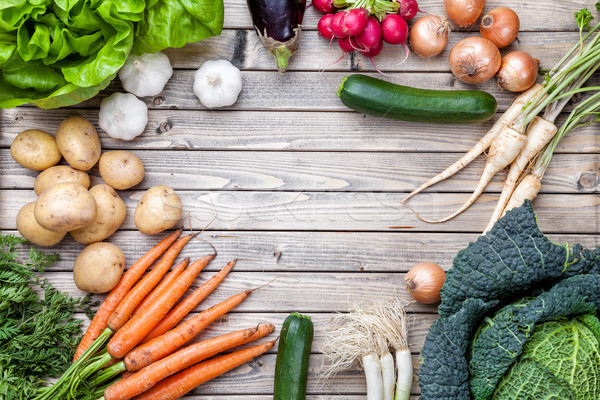 Fresh organic bio vegetables on wooden background Stock photo © tommyandone