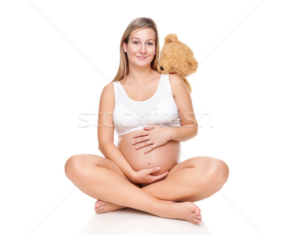 Portret zwangere vrouw vergadering vloer buik Stockfoto © tommyandone