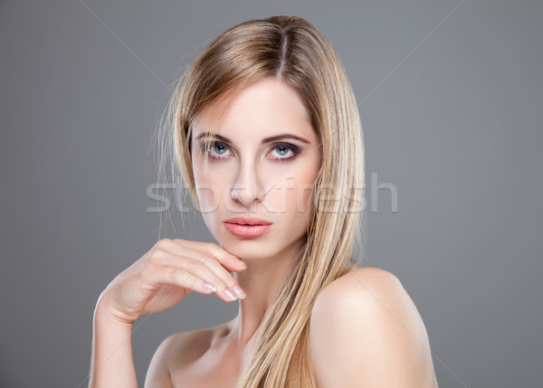 Young blonde beauty with straight hair Stock photo © tommyandone
