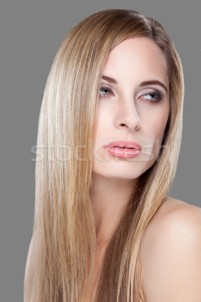Young blonde beauty with straight hair Stock photo © tommyandone