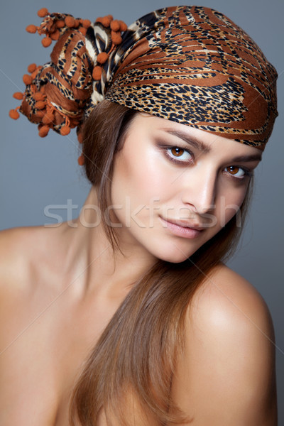 Beauty with a head scarf Stock photo © tommyandone