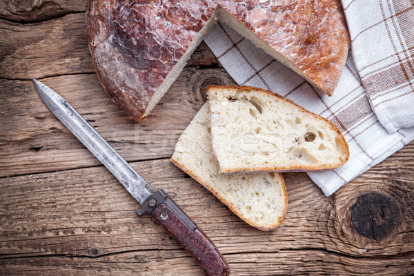 Delicious fresh bread on wooden background Stock photo © tommyandone