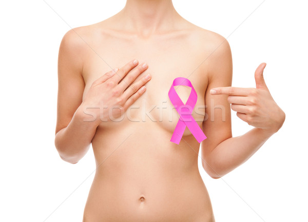 Woman with a breast cancer awareness ribbon Stock photo © tommyandone