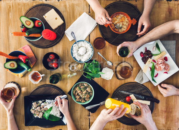 [[stock_photo]]: Haut · vue · groupe · de · gens · séance · table · repas