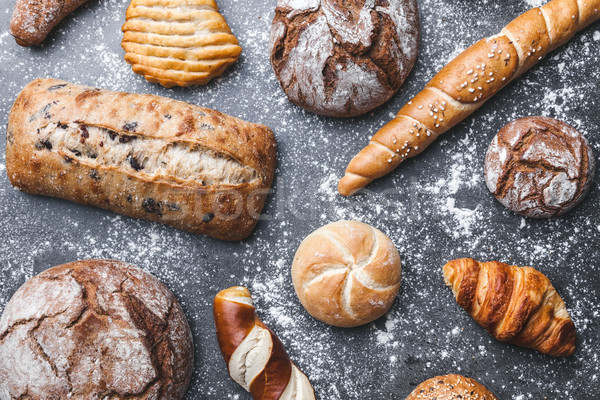 Delicious fresh bread on rustic background Stock photo © tommyandone