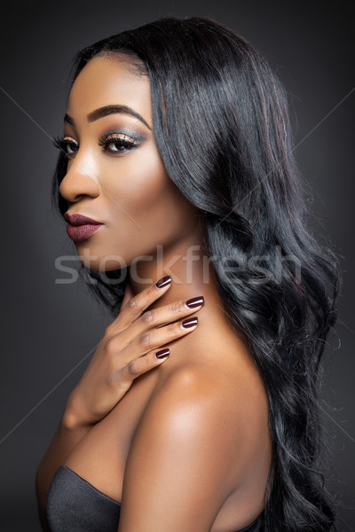 Black beauty with elegant long hair Stock photo © tommyandone