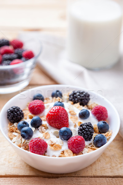 Healthy and nutritious yoghurt with cereal and fresh raw berries Stock photo © tommyandone