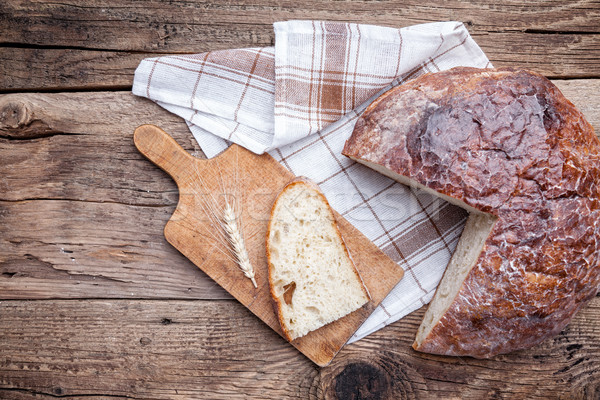 Delicious fresh bread on wooden background Stock photo © tommyandone