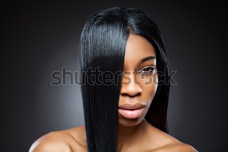 Beautiful black woman with long straight hair Stock photo © tommyandone