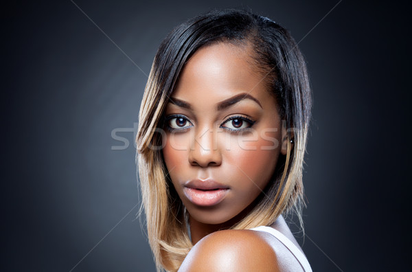 Young black beauty with perfect skin Stock photo © tommyandone