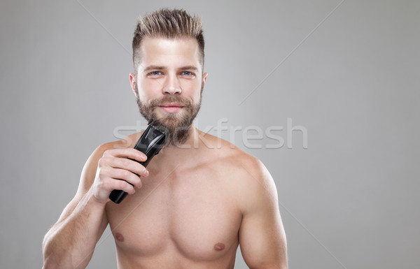 Jóképű szakállas férfi szakáll körülvágó fiatal Stock fotó © tommyandone