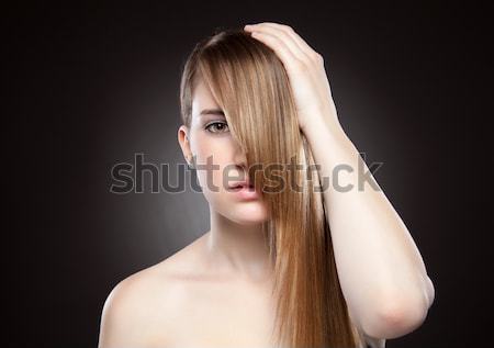 Woman with long straight hair Stock photo © tommyandone