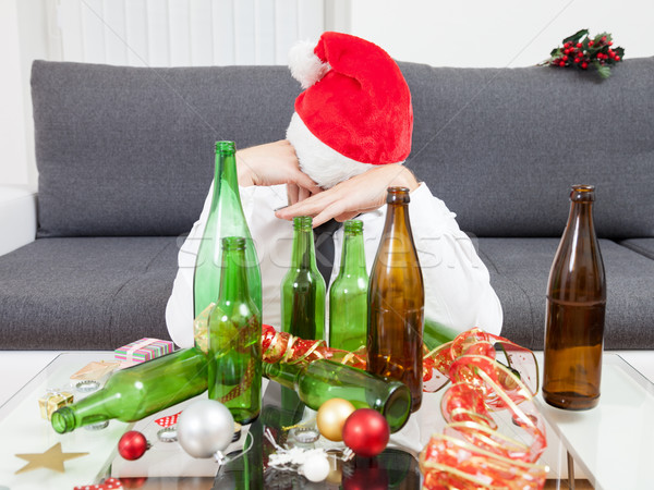 Drinking too much during Christmas time Stock photo © tommyandone