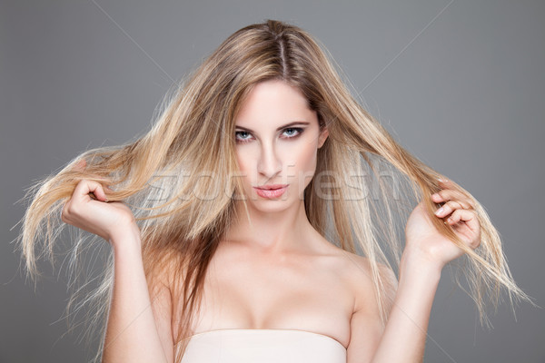 Beautiful woman with long messy hair Stock photo © tommyandone