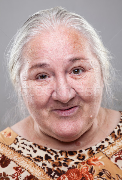 Portrait of an elderly woman Stock photo © tommyandone