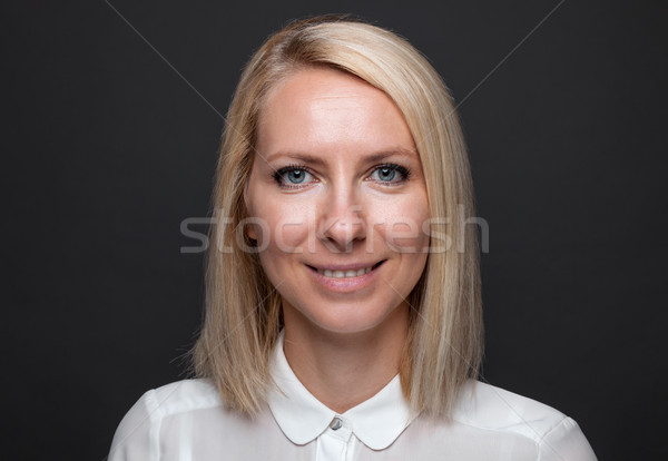 Headshot of young and happy business woman  Stock photo © tommyandone