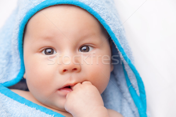 Stock photo: Beautiful newborn wrapped in a blanket
