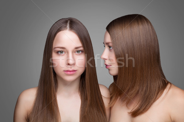 Twins with perfect skin and long straight hair Stock photo © tommyandone