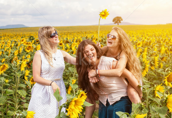 Group of friends having fun outdoors Stock photo © tommyandone