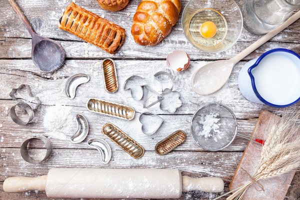 Delicious holiday baking background with ingredients and utensils Stock photo © tommyandone