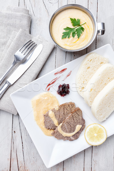 Traditional Czech and Slovak sirloin with cream sauce and dumplings Stock photo © tommyandone