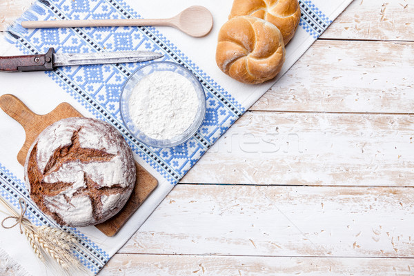 Delicious fresh bread on wooden background Stock photo © tommyandone