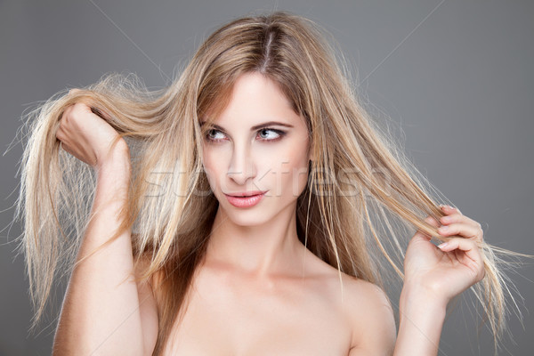 Beautiful woman with long messy hair Stock photo © tommyandone