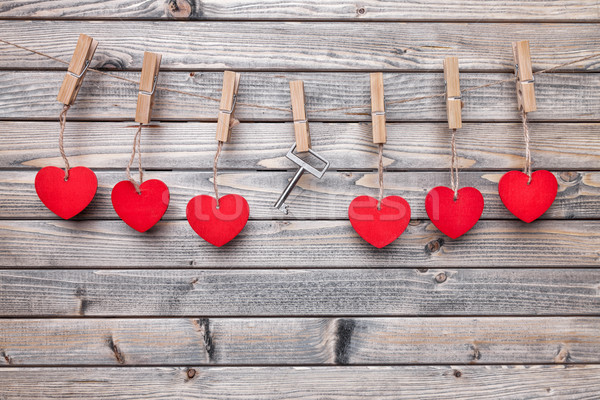 Hearts and key hanging on a string Stock photo © tommyandone