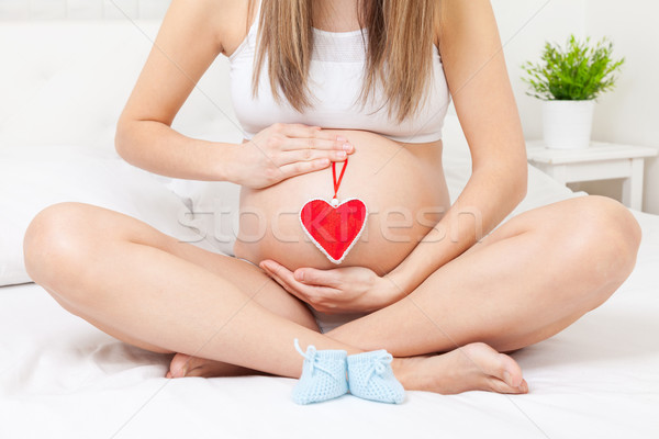 Zdjęcia stock: Kobieta · w · ciąży · relaks · bed · młodych · baby · szczęśliwy